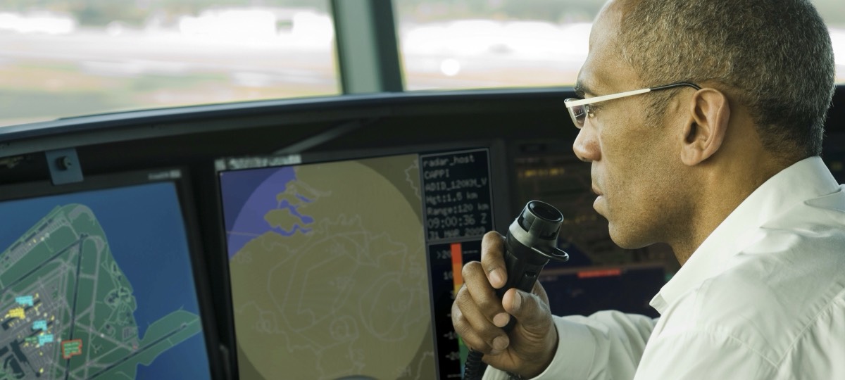 Controller at work in an airport control tower